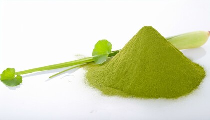 A green powdery substance is on a white surface