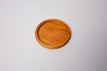 round wooden coasters with a plain white background