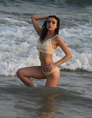 Beautiful young woman at the beach