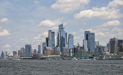 Fototapeta premium view of midtown manhattan frm weehawken waterfront (hudson river west new york city skyline skyscrapers sightseeing travel tourism destination) nyc dramatic sky harbor vista scenic buildings nj jersey