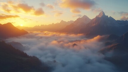 Fototapeta premium Golden Sunset Over a Misty Mountain Range
