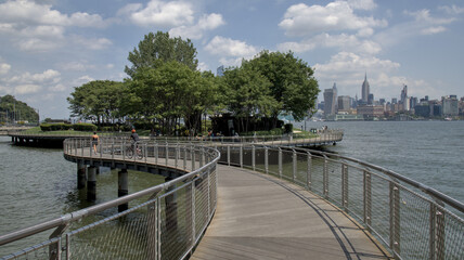 hudson river pier with midtown manhattan skyline skyscrapers (public park promenade) hoboken jersey city new jersey (waterfront castle point new york city nyc) travel tourism dock harbor