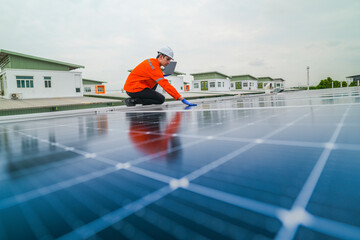 engineer man inspects construction of solar cell panel or photovoltaic cell by electronic device....