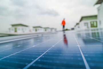 engineer man inspects construction of solar cell panel or photovoltaic cell by electronic device....