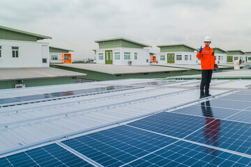 close up on grid of technology renewable solar energy. construction solar panels system on roof....