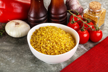 Dry wheat bulgur cereal heap