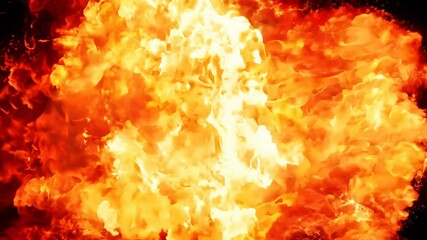 Fiery explosion transitioning from dark to green background