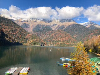 Lake Ritsa panoramic view at sunset in autumn. Lake Ritsa is a lake in the Caucasus Mountains in...