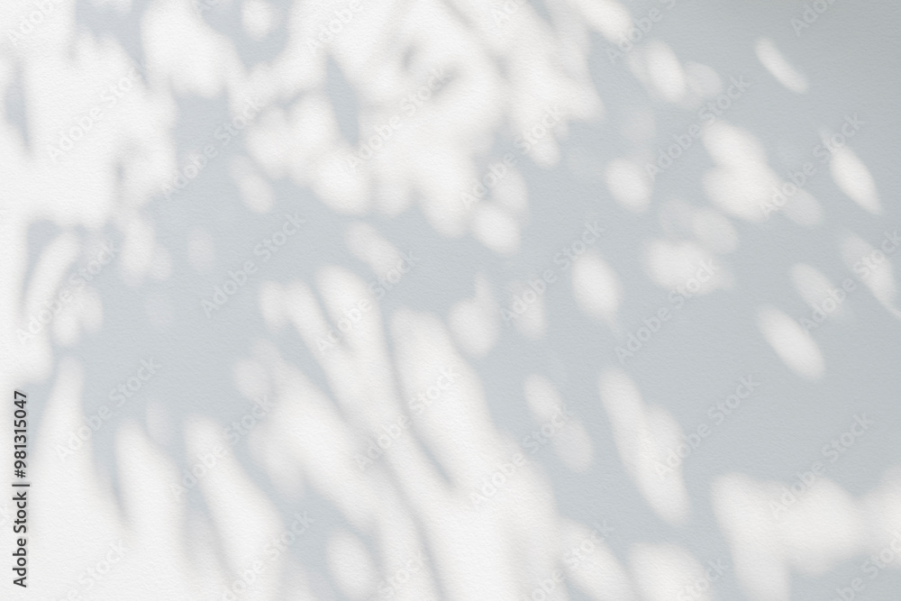 Poster abstract leaf shadow and light blurred background. natural leaves tree branch shadows and sunlight d