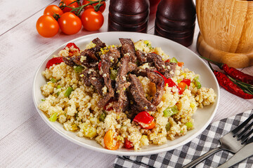Traditional couscous with beef and vegetables