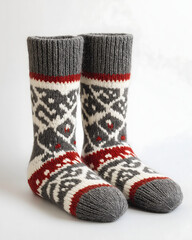 A pair of thick woolen socks in a classic Fair Isle pattern