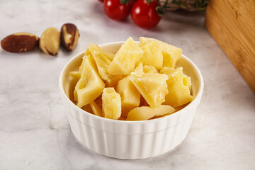 Crushed parmesan cheese in the bowl