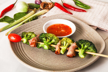 Thai Street foof satay with bacon and broccoli
