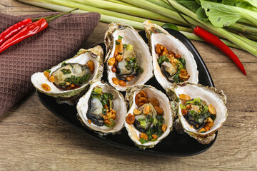 Baked oysters with green onion