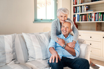 Hug, portrait and senior couple on sofa for connection, bonding and relax together at home. Happy,...