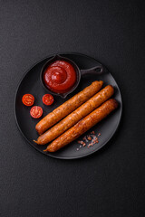 Juicy fried beef or pork sausages with salt, spices and herbs