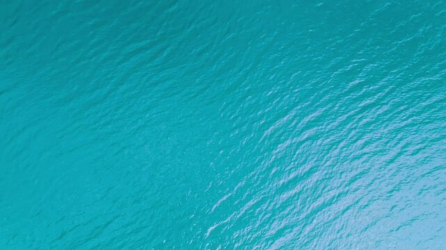 Amazing azure waterscape of the sea or ocean. Nautical backdrop from aerial perspective.
