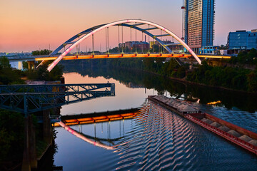 Fototapeta premium Korean Veterans Bridge at Blue Hour with Barge Motion in Nashville
