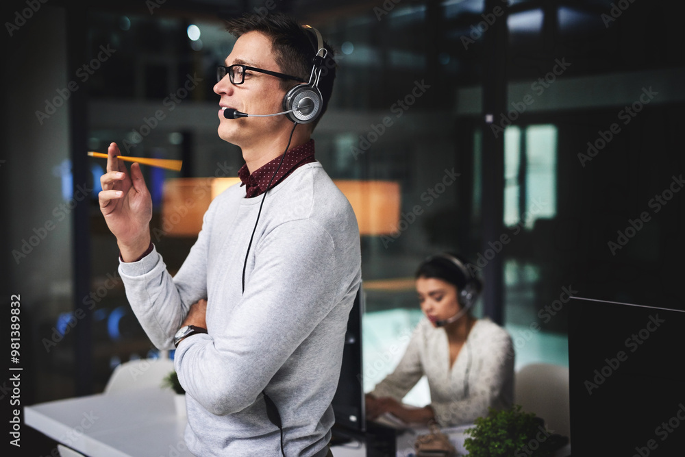 Poster Man, call center and listening with smile at night in office, thinking or problem solving for tech support. Person, agent and virtual consultant with voip headset, telemarketing and customer service