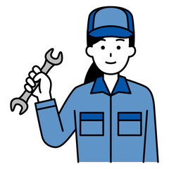 スパナを持つつなぎ作業服の女性