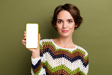 Photo portrait of pretty young girl hold device white screen qr code wear trendy print knitwear...