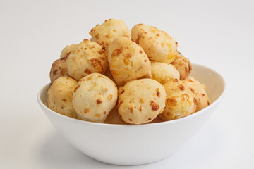 Brazilian cheese bread in a white bowl