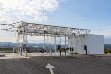 Self-service car wash, fast automatic car wash, many places on a busy highway.