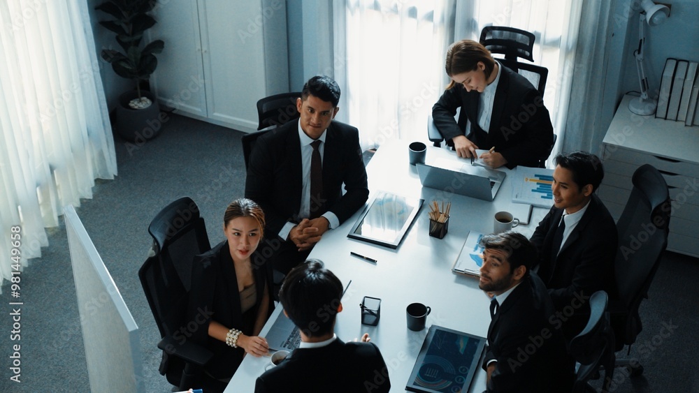 Aufkleber top view businesspeople placed tablet at table and planning strategy while diverse team discuss abou
