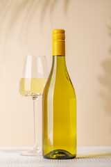 White wine bottle and wine glass