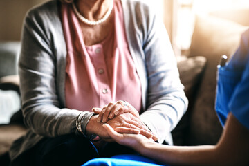 Healthcare, sympathy and holding hands with nurse and old woman for support, occupational therapy and empathy. Helping others, volunteer and medical with closeup of people in retirement home