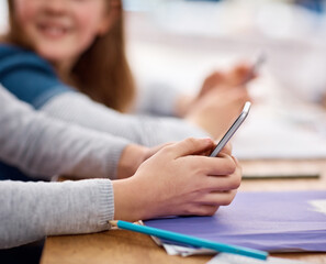 Phone, education and hands of child in classroom for network, research and digital library....