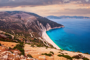 Famous Myrtos beach, Kefalonia most beautiful beach with turquoise Ionian sea in beautiful sunset