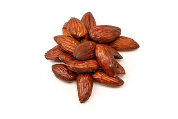 A group of caramelized almonds isolated on a white background.