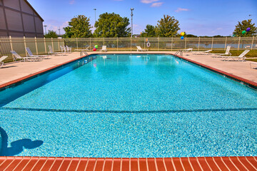 Serene Poolside Retreat with Festive Balloons Eye-Level Perspective
