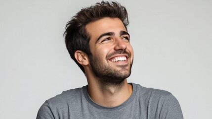 Fototapeta premium Young handsome man over isolated background looking away to side with smile on face, natural expression. Laughing confident. transparent background