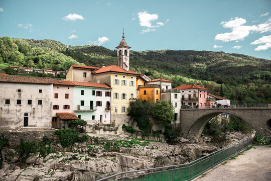 Beautiful ancient mediterranean town with stone arch bridge and emerald river. Kanal town in Slovenia