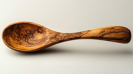 Detailed high-res image of a rustic wooden spoon, isolated on a neutral background, showing the natural grain and texture of the wood