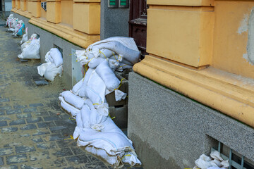Sand bags in front of the  door in the house on riverbank of  Svratka, Brno, Czech republic, floods after storm Boris, September 15, 2024.
