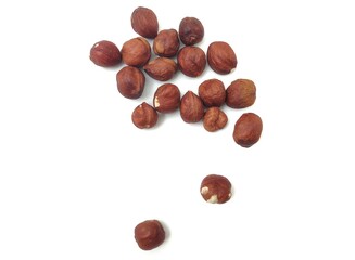 Top view of raw hazelnuts, rich in healthy fats, vitamins E and B, and essential minerals like magnesium. These nutritious nuts provide heart health benefits and are a great snack.