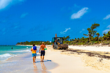 Excavator does work on the beach Playa del Carmen Mexico.