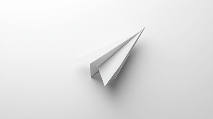 Fototapeta premium A simple paper airplane symbol, standing out against a plain white backdrop.