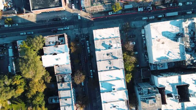 Aerial top down Prospect Heights Brooklyn roofs and roads city during fall in New York City NY