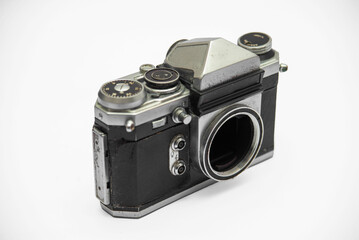 Poorly treated photo camera destroyed by time damaged broken