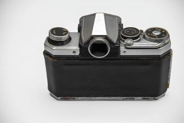 Poorly treated photo camera destroyed by time damaged broken