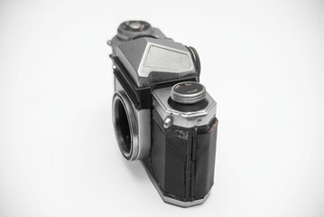 Poorly treated photo camera destroyed by time damaged broken