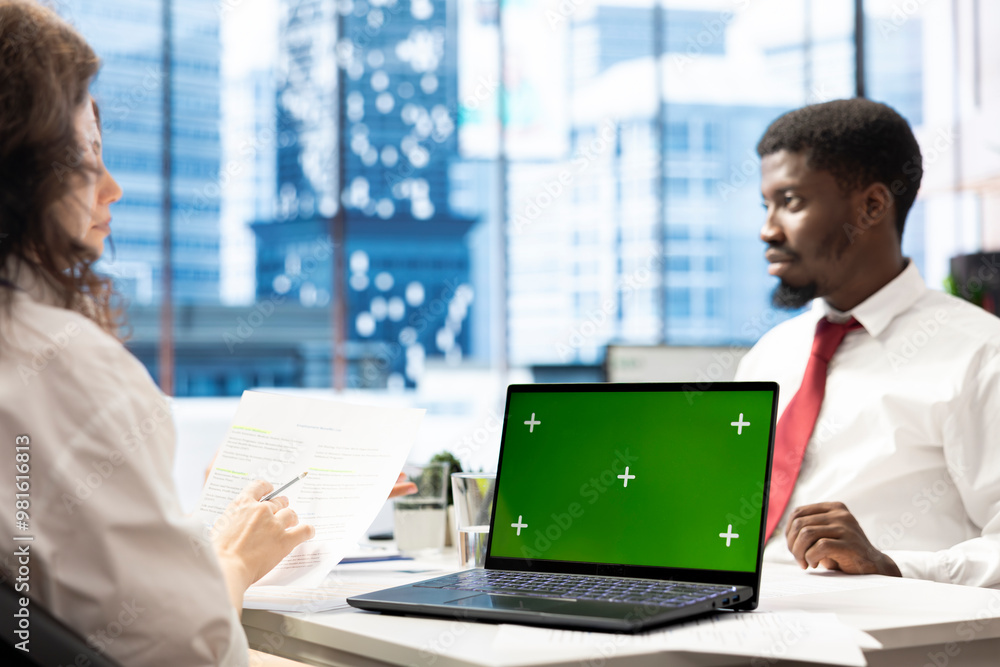 Poster hr specialist using green screen laptop to reviewing candidate cv, asking questions about qualificat