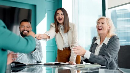 Applause, handshake and business people in office for meeting with deal, partnership or agreement. Clapping, diversity and group of professional creative designers shaking hands for team in workplace