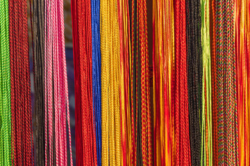 Brightly colored cords for sale in Pushkar.