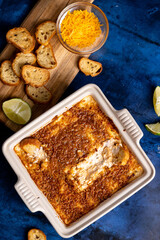 overhead shot of dip with crostinis 