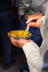 Eating street food at an outdoor market in Pushkar.